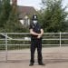 MATHON, UNITED KINGDOM - JULY 12 - JULY 12: A police officer wearing a surgical face mask stands at the entrance to AS Green and Co farm on July 12, 2020 in Mathon, Herefordshire. AS Green and Co, based in Mathon near Malvern, has said 73 of its 200 employees have COVID-19 following an outbreak there. Workers are being asked to isolate on the farm and stay within household groups to reduce the risk of spreading the virus within the workforce. (Photo by Matthew Horwood/Getty Images)