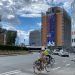 A rider passes with her bike in front of EU Headquarters in Brussels, Belgium