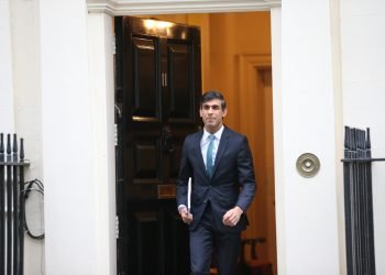 British Chancellor Rishi Sunak leaves 11 Downing Street ahead of unveiling spending review.