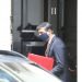 British Chancellor of the Exchequer Ridhi Sunak leaves 11 Downing Street.