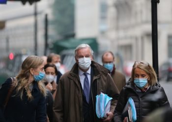 EU's Chief Brexit Negotiator Michel Barnier walks from his hotel to the the 1 Victoria Street to attend the new round of trade talks in London.