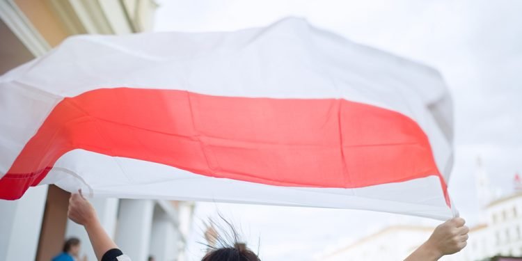 MINSK, BELARUS - August 13, 2020: Peaceful protest in Minsk. Flag of Belarus. White red white