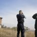 Two border policemen observe border