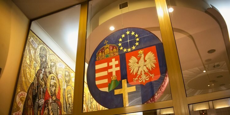 Coats of arms of Hungary and Poland in Basilica of the Divine Mercy of Sanctuary in Lagiewniki. Millions of pilgrims from around the world visit sanctuary every year.