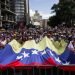 Caracas, Capital District/Venezuela; 01-23-2019: Group of protesters shows their support for Juan Guaido. During his oath