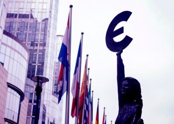 The European Union, flags, the building of the European Parliament, the euro