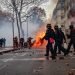 Paris, France: Firefighters extenguishing a car on fire during the Yellow Vests protest against Macron politic.