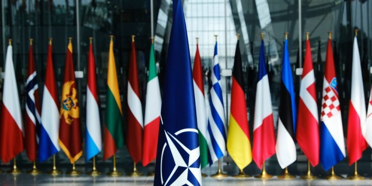 Flags' of Members of NATO at the NATO headquarters in Brussels, Belgium, June 26, 2019.