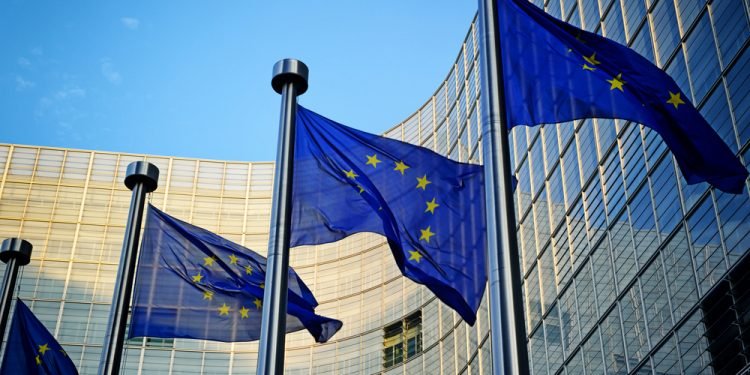 EU flags in front of European Commission in Brussels