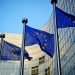 EU flags in front of European Commission in Brussels