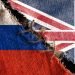 The gap between the two flags, Russia and Great Britain, as a concept of political confrontation.