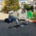 Sliven / Bulgaria - August 21, 2019: Garbage containers overflowing. Trash around the containers including toilet pot. Disgusting misery.