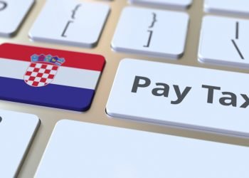 PAY TAX text and flag of Croatia on the buttons on the computer keyboard.