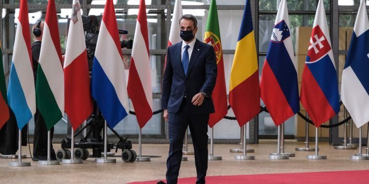 Greek Prime Minister Kyriakos Mitsotakis arrives at the first face-to-face EU summit since the coronavirus disease (COVID-19) outbreak, in Brussels, Belgium July 17, 2020.