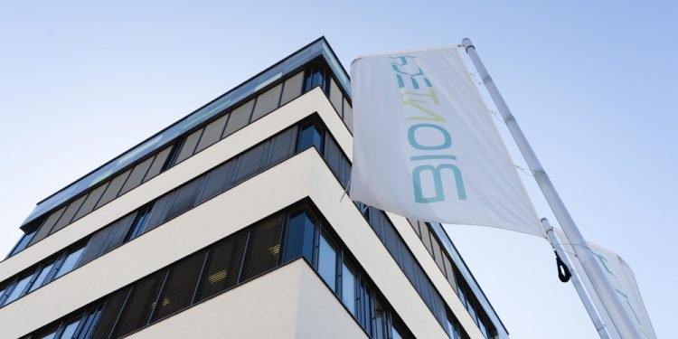 Mainz, Rheinland-Pfalz, Germany-9. September 2020 Waving flags the Biontech logo at the Biontech building in Mainz