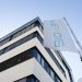 Mainz, Rheinland-Pfalz, Germany-9. September 2020 Waving flags the Biontech logo at the Biontech building in Mainz