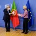 Portugal's Prime Minister Antonio Costa, left, is welcomed by European Commission President Ursula von der Leyen prior to a meeting at EU headquarters in Brussels, Belgium on Oct. 15, 2020