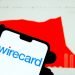 Stone /United Kingdom - June 26 2020: Wirecard logo on smartphone and Wirecard AG stock price graph (3 month period, as of June 26 2020) on blurred background. Not a montage.