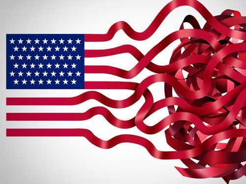 Government red tape concept and American bureaucracy symbol as an icon of the flag of the United States with the red stripes getting tangled in confusion as a metaphor for political inefficiency.