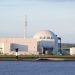 BROKDORF, GERMANY - June 4, 2017: Riverside view of Brokdorf Nuclear Power Plant. It started in October 1986 and the decommissioning is planned for 2021.