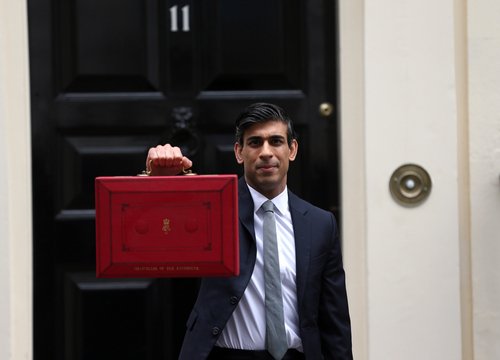 London, United Kingdom - March 03 2021: Chancellor of the Exchequer Rishi Sunak leaves 11 Downing Street with the red dispatch box ahead of revealing the budget in the House of Commons.