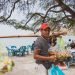 Dili (East Timor) - November 28th 2019: Street vendor selling fresh fruit on the beach