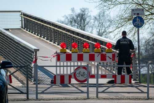 Kehl, Germany - March 22, 2020: German Federal police closed the border bridge due Coronavirus COVID-19 pandemic SARS-CoV-2 Epidemic at France control checkpoint to prevent further spread of virus.