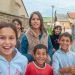 05-16-2018. Lomnicka, Slovakia. A close-up of a Roma or Gypsy group of children smiling in an abandoned community in the heart of Slovakia, living in miserable conditions.