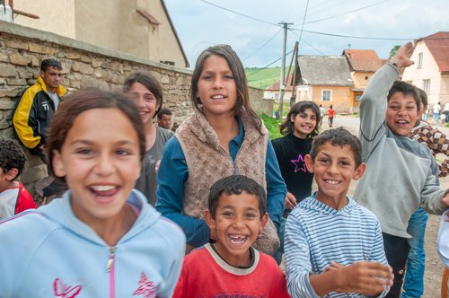 05-16-2018. Lomnicka, Slovakia. A close-up of a Roma or Gypsy group of children smiling in an abandoned community in the heart of Slovakia, living in miserable conditions.