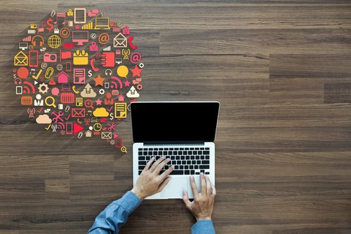 Business innovation technology set application icons, With businessman working on laptop computer PC on wood table, view from above