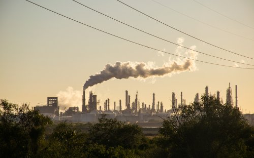 Oil refineries polluting carbon and cancer causing smoke stacks climate change and power plants in Corpus Christi , Texas a massive large refinery