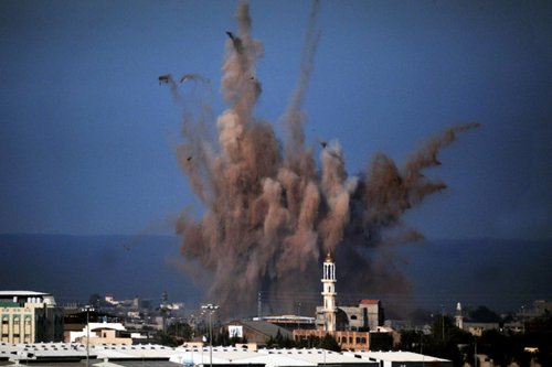 GAZA STRIP - JANUARY 14 2009: Aerial bombing explosion in Gaza Strip during Cast Lead operation. It was a three-week armed conflict in the Gaza Strip during the winter of 2008-2009.