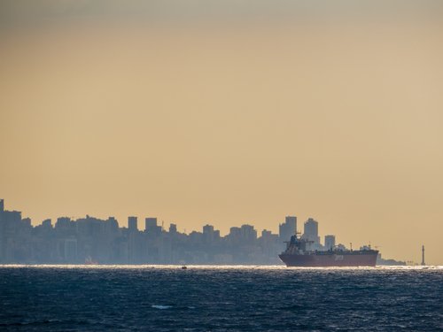 BEIRUT, LEBANON - NOVEMBER 5, 2017: Huge cargo ship in front of the port.