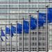 Row of EU Flags in front of the European Union Commission building in Brussels