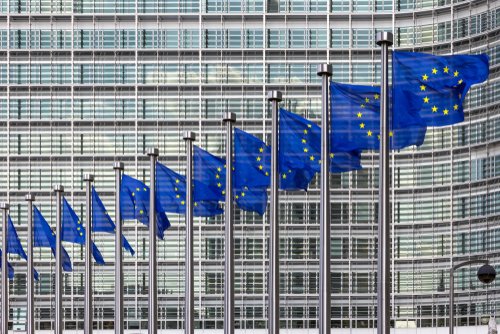 Row of EU Flags in front of the European Union Commission building in Brussels