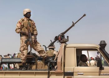 Ingall, Niger - september 2013: Governmental military guard in North Africa Car with armed soldiers