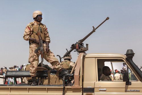 Ingall, Niger - september 2013: Governmental military guard in North Africa Car with armed soldiers