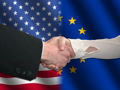 handshake over American and EU flags illustration
