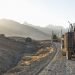 GHAZNI, AFGHANISTAN - NOVEMBER 2010: ISAF forces patrol the roads in the mountains of Afghanistan in armored military vehicles in RC East.