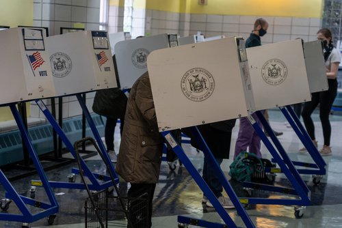 NEW YORK, NY – NOVEMBER 03: People cast their vote for the 2020 U.S Presidential Election at a polling site in Manhattan on November 3, 2020 in New York City.