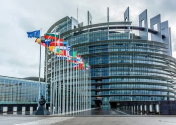 STRASBOURG, FRANCE - DECEMBER 21, 2014: Exterior of European Parliament (Louise Weiss building, 1999) in Wacken district of Strasbourg. It is one of biggest and most visible buildings of Strasbourg.