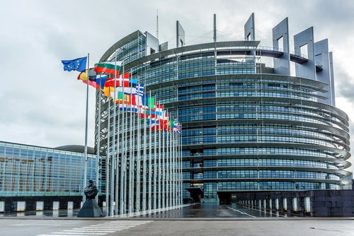 STRASBOURG, FRANCE - DECEMBER 21, 2014: Exterior of European Parliament (Louise Weiss building, 1999) in Wacken district of Strasbourg. It is one of biggest and most visible buildings of Strasbourg.