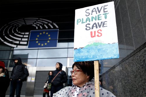 Brussels, Belgium. 27th January 2019.People take part in a march called 'Rise for Climate' .
