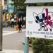 TOKYO, JAPAN - June 30, 2021: A sign promoting the Tokyo Olympics and Paralympics featuring their mascots Miraitowa and Someity in a park in Tokyo's Akihabara area.