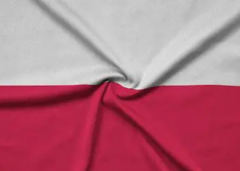 Poland flag  is depicted on a sports cloth fabric with many folds. Sport team waving banner