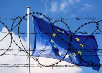 EU Flag and fence with barbed Wire concept Picture