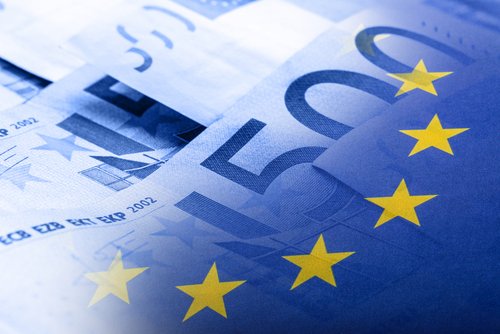 European union flag on a euro money background.