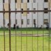 Pabrade Lithuania - July 17 2021: Group of migrants in Pabrade Detention Centre. Buildings to accommodate immigrants coming over Belarussian Lithuanian border. Tiny rural town.