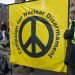 London, UK. 11th January 2020. Anti war protesters with CND banner at the NO WAR WITH IRAN demonstration in Portland Place, London, campaigning for peace and de-escalation in the Middle East.