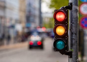 A,City,Crossing,With,A,Semaphore,,Red,And,Orange,Light